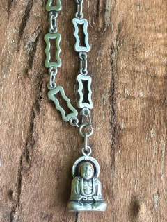 Excentrica y antigua cadena de plata 900 y buda