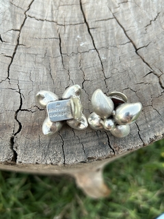 Aros clip de plata 900 A Belgiorno diseño flores en internet