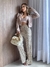 Blazer cropped com botões metalizados na internet