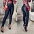Calça skinny preta acetinada com cinto - comprar online
