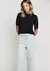 Blusa Decote Redondo Em Viscose - Preto - comprar online