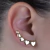 Brinco Ear Cuff 5 Corações Folheado a Ouro 18K - comprar online