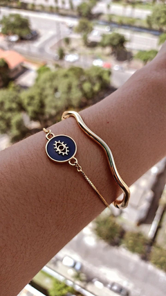 Pulseira dourada formato olho grego