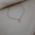 Tornozeleira com pingente redondo com zircônia cristal banhado a ouro 18k - 89064320 na internet