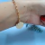 Pulseira cartie feminina com medalha de São Bento banhada a ouro 18k - 26192536