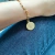 Imagem do Pulseira cartie feminina com medalha de São Bento banhada a ouro 18k - 26192536