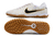 Chuteira Nike Tiempo 10 Academy Society Branca/Dourada - Corredofut