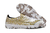 Chuteira Society Mizuno Alpha Elite AS Dourada