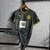 Camisa Borussia Dortmund Pré-Jogo 22/23 Torcedor Puma Masculina - Preto e amarelo