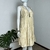 Vestido Dourado Corta Vento - San na internet