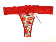 Tanga cintura puntilla besos fondo turquesa
