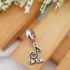 Berloque Em aço Inox/TikTok