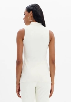 BLUSA ALONGADA LANÇA PERFUME na internet