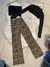 TOP NEGRO BANDO CON COSTURAS BLANCAS - comprar online