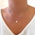 Colar gargantilha choker em aço inox antialérgico prata com pingente de mini triângulo EM48 - comprar online