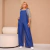 Macacão Jeans Pantalona Com Bolsos e Alcinha de Amarrar - comprar online