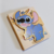 Bloco de Notas Adesivado Sanfona Stitch na internet