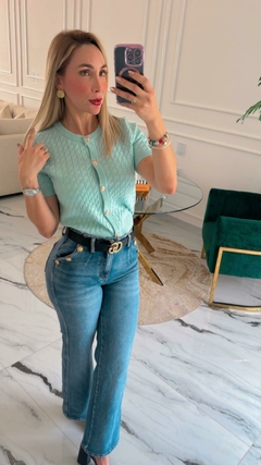 Blusa con botones dorados