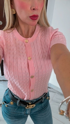 Blusa con botones dorados