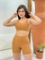 Conjunto Short Meia Coxa com Bolso e Top Costa Nua Fitness