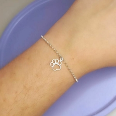 Pulseira com pingente de patinha