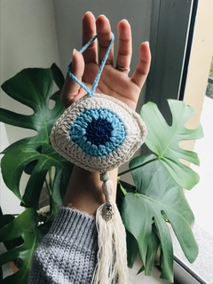 colgante de ojo turco beige