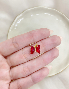 Dijes mariposa roja