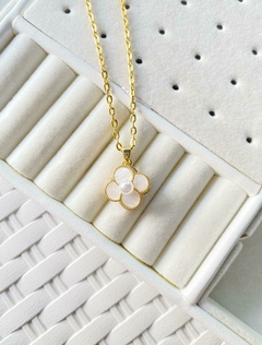 Conjunto giratorio flor con perla blanca
