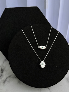 Escapulário Mão de Hansã + Olho grego - comprar online