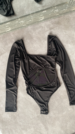 Body cut out broches