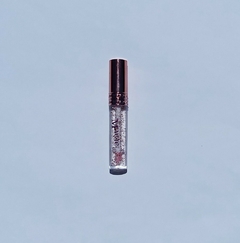 Lip gloss Magic - imán of noble (Deja color rosado)