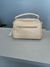 Bolsa Média com Detalhe no Ziper na internet