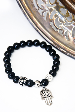 Pulsera con Bolitas negras, bolita de acero, bolita de fuego con strass, Charms y dije Mano de Fátima (Acero quierúrgico)