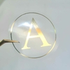 Adesivo transparente dourado 20 unidades 5x5cm Hotstamping Iniciais - comprar online