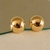 Brinco Mari Meia Bola banhado a ouro 18k
