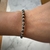 Pulsera Ultraliviana negra y plata