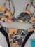 Biquini String Estampa Mandala (preto e laranja) - loja online
