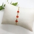 Pulseira bolinhas vermelhas
