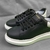 ALEXANDER MCQUEEN OVERSIZED COURO PRETO/BRANCO - Lojas Kayra 