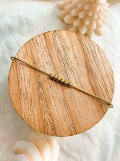 Pulsera acero dorado 5 bolitas - comprar online