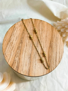 PULSERA ACERO DORADO CON BOLITAS