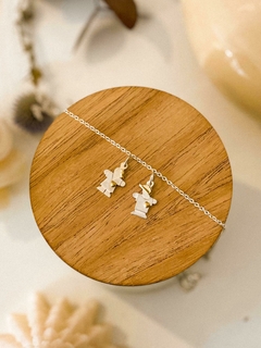 DIJE NENE/NENA PLATA Y ORO CON CADENA ACERO BLANCO - Ivanala Joyas