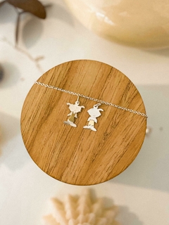 DIJE LOQUITOS PLATA Y ORO CHAPITA CON CADENA DE ACERO BLANCO - comprar online