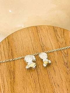 DIJE PLATA Y ORO NENE/NENA (FRENTE Y DORSO) CON CADENA ACERO BLANCO - comprar online