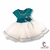 Vestido elegante para niña. Vestido con falda de tul y aplicación floral en la cintura.