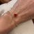 Pulseira trevo vermelho