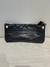 Clutch Michael Kors Preta na internet