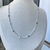 Riviera cravejada 2mm flores verde e cristal - Joia em Prata 925 - comprar online
