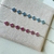 Pulseira pingentes mini flores - Joia em Prata 925