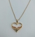 Gargantilha Coração Cravejado de Zircônias Coloridas Folheado a Ouro 18k - comprar online